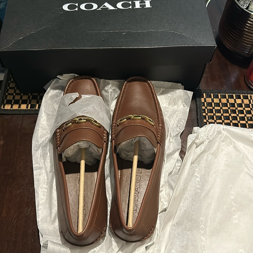 Brand new Coach loafers. Size 8. Never worn!
